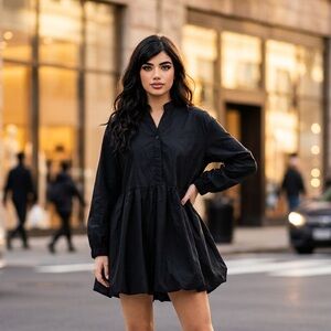 Little black dress with puffy bottom says size large